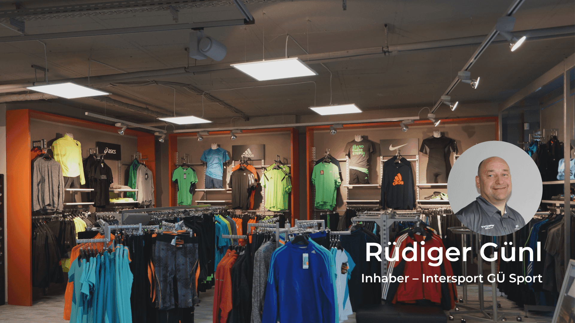 Sportswear store interior with athletic clothing displays and owner Rüdiger Günl's profile.