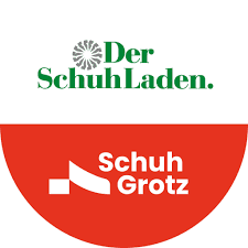 Two shoe store logos: 'Der Schuh Laden' in green and 'Schuh Grotz' in white on red.